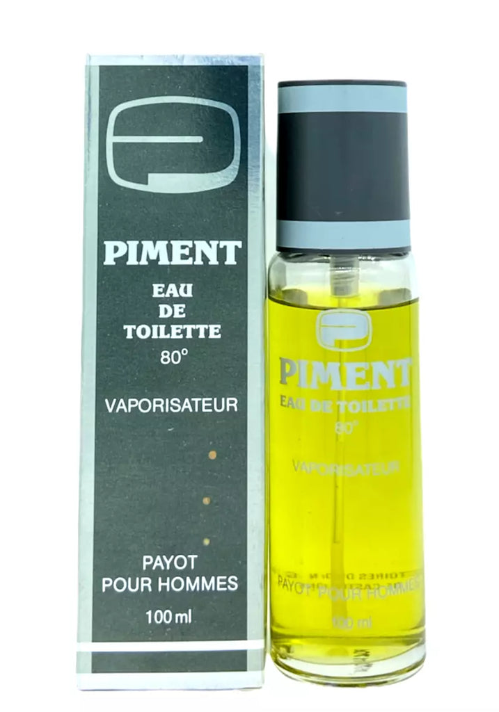 Flakon des Payot - Piment Pour Hommes Eau de Toilette. Maskuliner Herrenduft mit würzigen und holzigen Noten, ideal für den modernen Mann, der einen markanten, langanhaltenden Duft bevorzugt