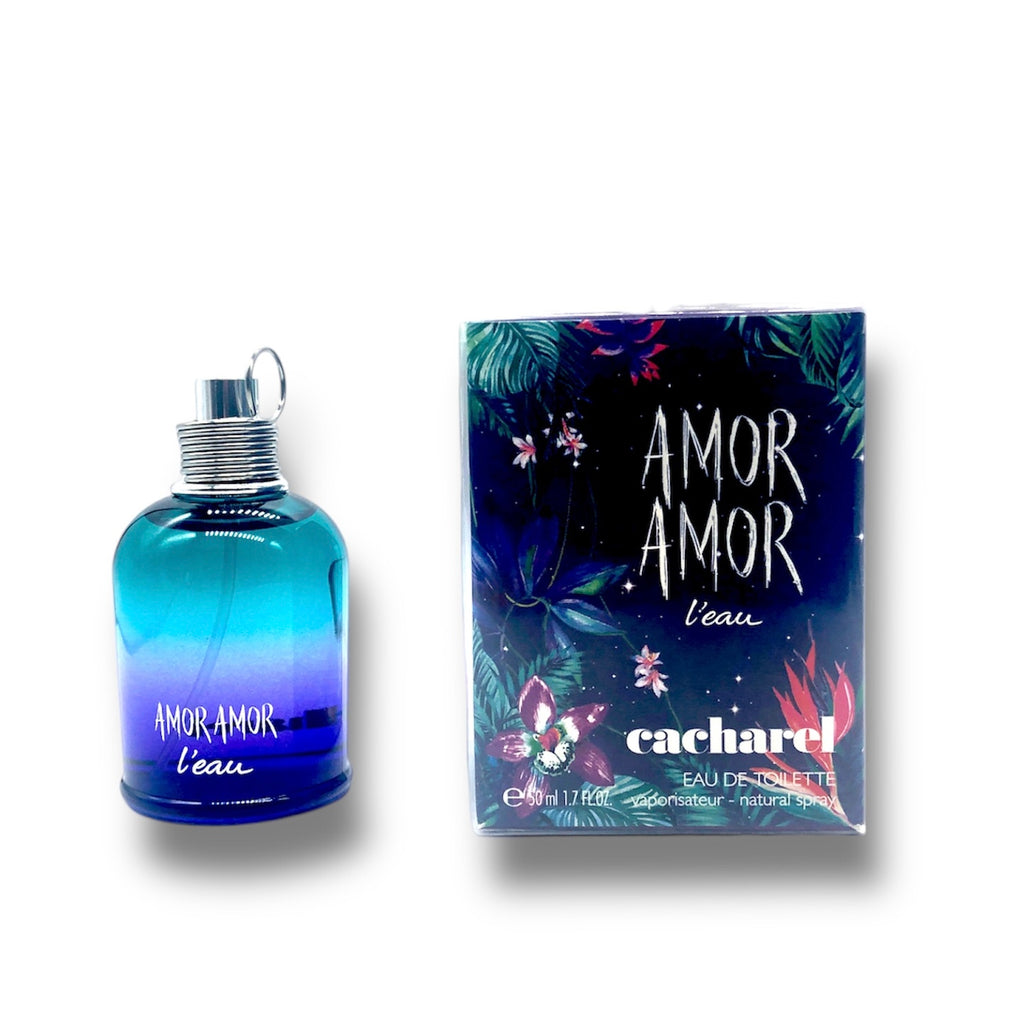 Flakon von Cacharel - Amor Amor L'Eau 2016 Noite Brasileira Eau de Toilette in lebhaftem, tropischem Design mit Blumenmotiven. Limitierte Sommeredition mit fruchtig-frischen Duftnoten von Grapefruit, Passionsfrucht, Jasmin und Vanille
